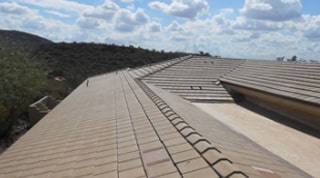 Roof repair services on gable and flat roof